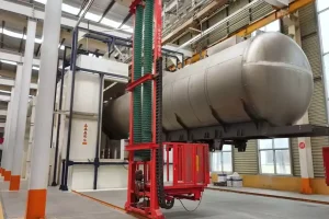 Spraying paint on semi trailers